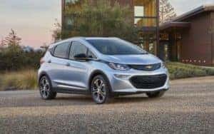 Silver Chevy Bolt EV in a driveway