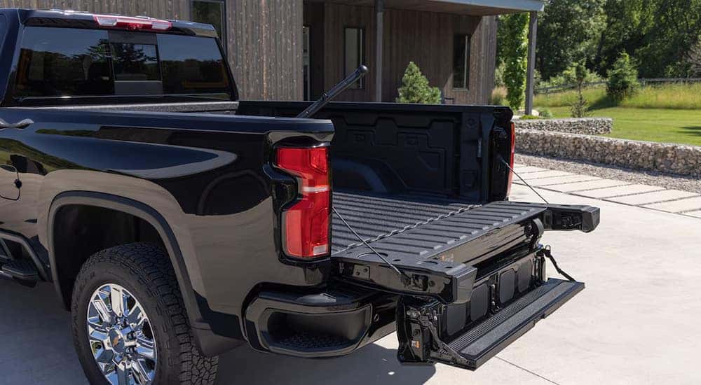 The Multi-Flex tailgate on a black 2024 Chevy Silverado 2500 for sale near Charleston.