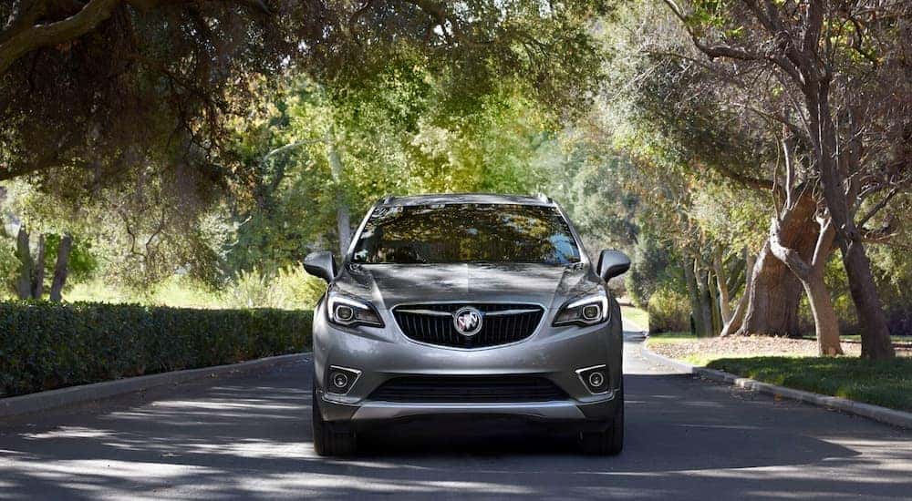 A grey 2020 Buick Envision is shown from the front after leaving a Kentucky used car dealership.
