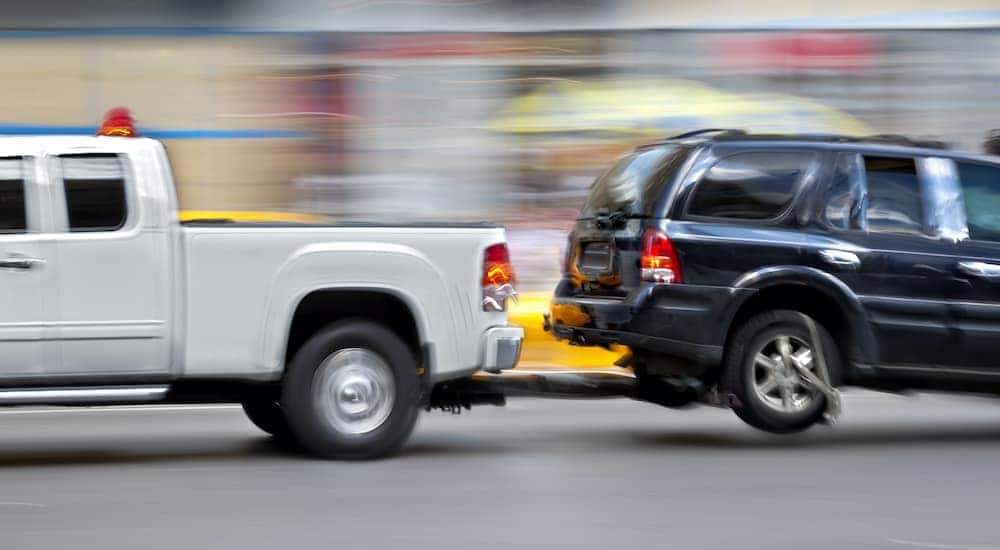 A truck is being used to offer a towing service.