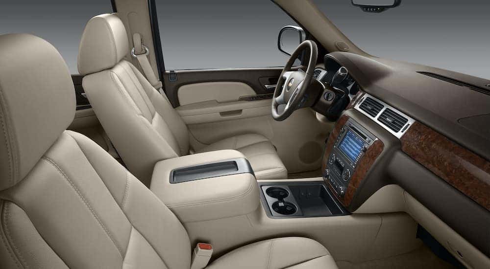 The beige interior is shown on a 2011 used Chevy Tahoe LTZ.