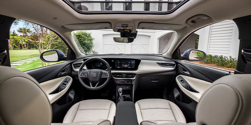 Interior design of a Buick Encore GX showcasing the center console and steering wheel