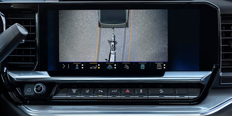 Chevrolet Silverado HD interior view of the back up camera hitching another vehicle