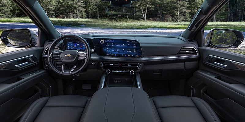 Interior design of a Chevrolet Tahoe showcasing the center console and steering wheel